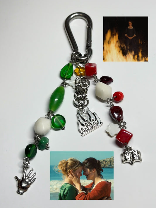portrait of a lady on fire - carabiner
